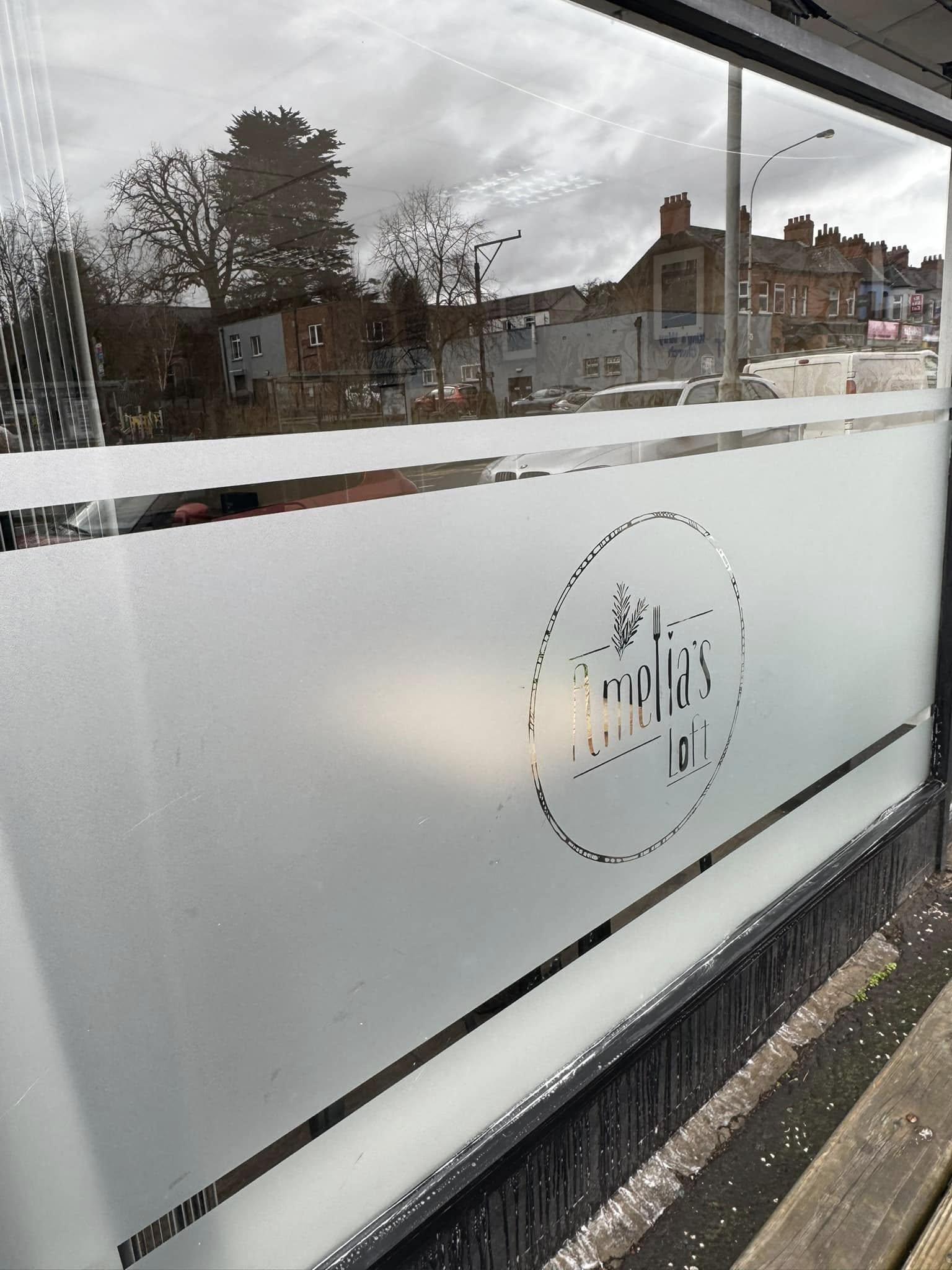 exterior window decal restaurant window cleaned