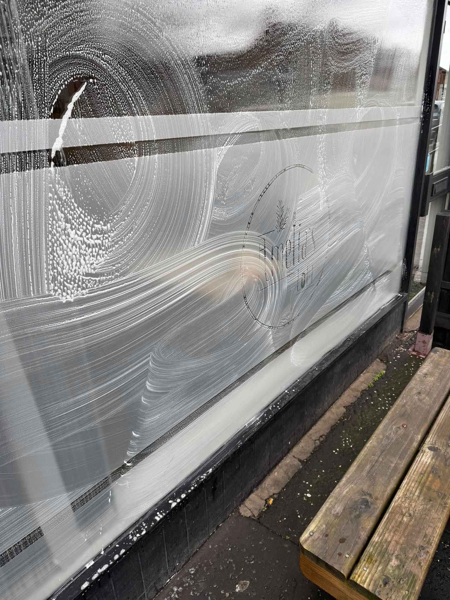 exterior window decal restaurant window during cleaning