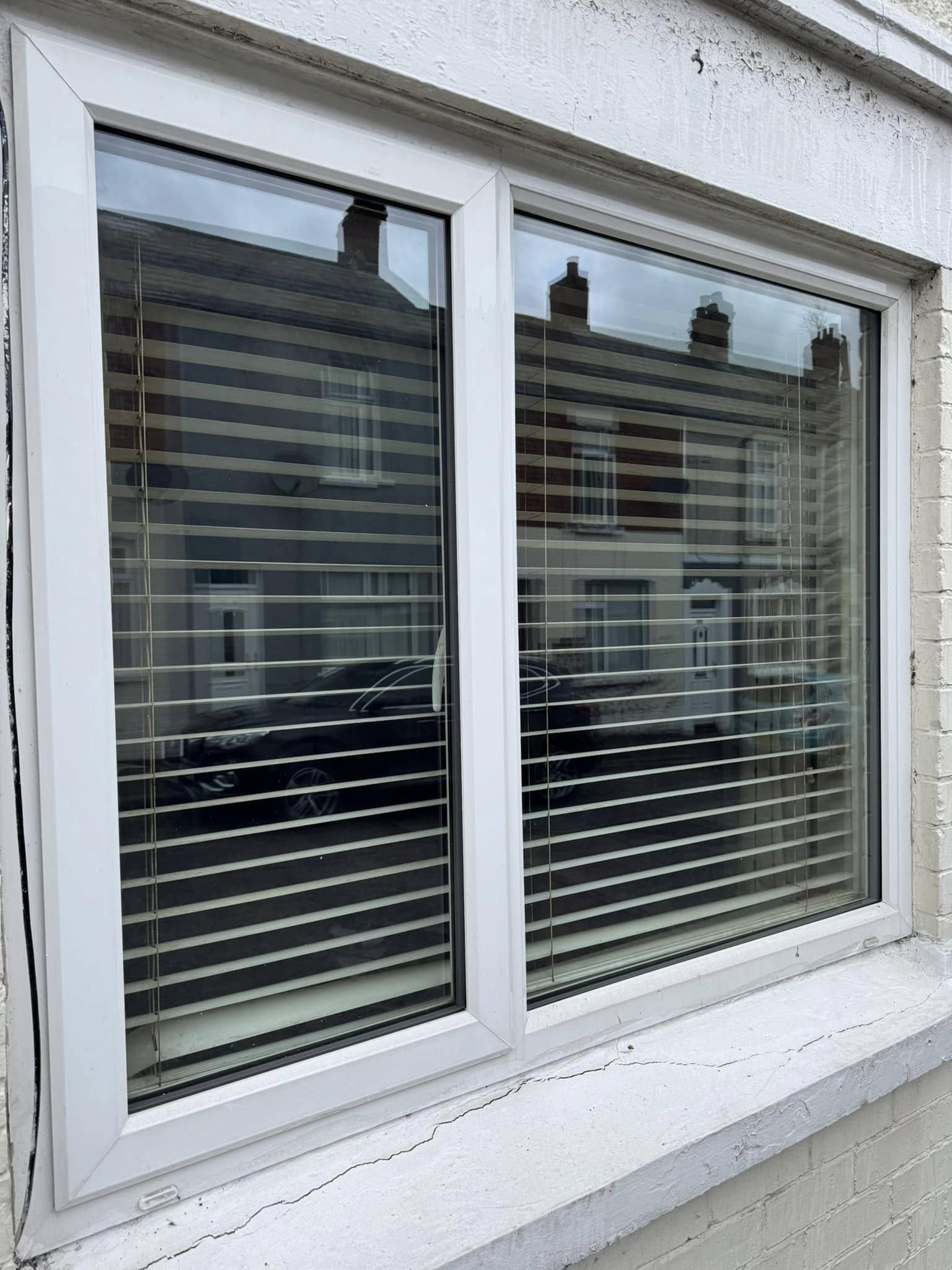 dirty PVC window after cleaning ninja cleaning services ni