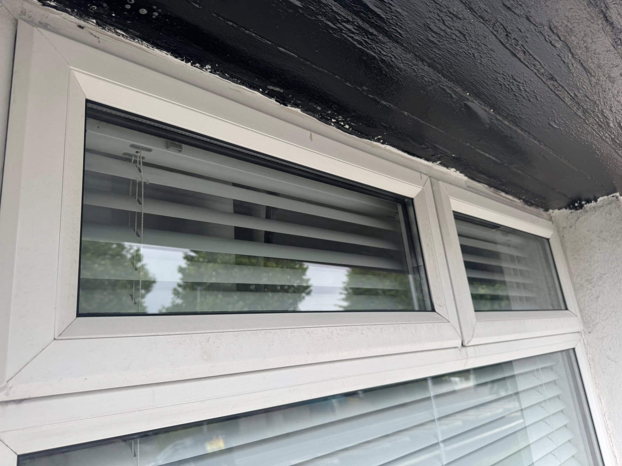 dirty PVC window after cleaning ninja cleaning services ni